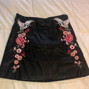 Embroidered faux leather skirt